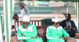 How Odok, Ojing, Agunbiade Emerged Champions At Maiden JOE Tennis Tournament …the Minister of Sports Development, John Owan Enoh with his wife, Mrs Rachel Owan Enoh during the final of the tournament…