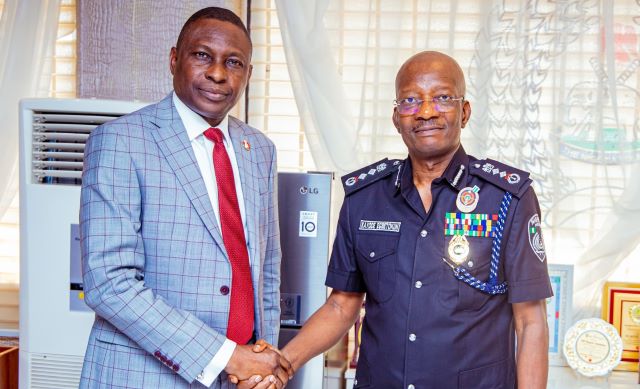 ...the Inspector General of Police,  Kayode Egbetokun, right, with the Executive Chairman of the Economic and Financial Crimes Commission, EFCC,  Mr. Ola Olukoyede...