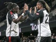 Iwobi Named In Premier League TOTW Calvin Bassey, left, with Alex Iwobi...