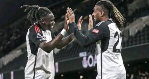 Iwobi Named In Premier League TOTW Calvin Bassey, left, with Alex Iwobi...