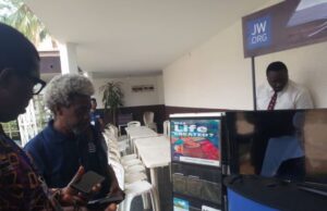 Enhancement Of Global Security: African Pragmatics Association, Jehovah’s Witnesses Forge Common Front …Professor Sola Olorunyomi, and Professor Gill Adekannbi looking at the stand of Jehovah's Witnesses at the exhibition, Subomi Balogun Conference Centre, University of Ibadan, venue of the two conference of the African Pragmatics Association…