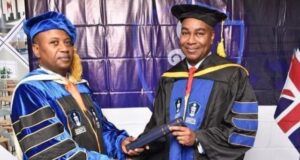 Dayo Olomu Bags Honorary Doctorate Degree In Leadership Development From London’s IUIM Dr Dayo Olomu, right, receiving his award... Picture shot by Ola Hakeem...