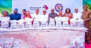 Support For Vulnerable Households: Excitement As Lagos Receives Dangote’s Rice L-R: Commissioner for Agriculture, Ms. Abisola Olusanya; Head of Service, Mr. Olabode Agoro; board member, Aliko Dangote Foundation, Mrs. Hajara Abiodun; Secretary to the State Government, Barr. Bimbola Salu-Hundeyin; member of the State House of Assembly, Hon. Olotu Emmanuel; Chairman of Dangote Group, Alhaji Aliko Dangote; Governor of Lagos State, Mr. Babajide Sanwo-Olu; Group Executive Director, Commercial Operations, Dangote Industries, Fatimah Aliko Dangote; Managing Director/CEO, Aliko Dangote Foundation, Zouera Youssoufou; Nigerian Businessman, Mr. Femi Otedola and the Chief of Staff to the Governor, Mr. Tayo Ayinde, during the flag-off of distribution of bags of rice to vulnerable households in Lagos, held at the Lagos House, Ikeja, on Wednesday…