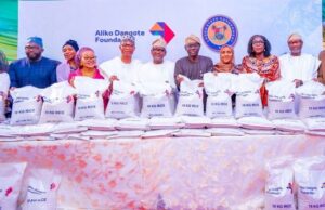 Support For Vulnerable Households: Excitement As Lagos Receives Dangote’s Rice L-R: Commissioner for Agriculture, Ms. Abisola Olusanya; Head of Service, Mr. Olabode Agoro; board member, Aliko Dangote Foundation, Mrs. Hajara Abiodun; Secretary to the State Government, Barr. Bimbola Salu-Hundeyin; member of the State House of Assembly, Hon. Olotu Emmanuel; Chairman of Dangote Group, Alhaji Aliko Dangote; Governor of Lagos State, Mr. Babajide Sanwo-Olu; Group Executive Director, Commercial Operations, Dangote Industries, Fatimah Aliko Dangote; Managing Director/CEO, Aliko Dangote Foundation, Zouera Youssoufou; Nigerian Businessman, Mr. Femi Otedola and the Chief of Staff to the Governor, Mr. Tayo Ayinde, during the flag-off of distribution of bags of rice to vulnerable households in Lagos, held at the Lagos House, Ikeja, on Wednesday…