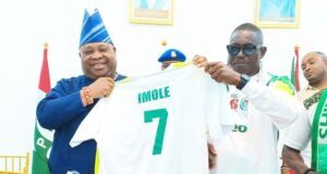 Day Super Eagles’ Supporters’ Club Secured Adeleke’s Backing Osun's Gov Ademola Adeleke, left, receiving his branded jersey from Prince Vincent Okumagba...