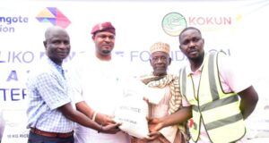 Dangote Foundation Gives Out Rice To Host Communities In Ogun L--R, Head, Social Performance, Dangote Cement Ibese plant, Ademola Ojolowo; Aboro of Ibeseland, Oba Rotimi Mulero; one of the Beneficiaries, Pa Adams Babatunde and Manager of the partnering Kokun Foundation, Mr. Isikhuemen Akuekegbe, during the rice distribution at Ibese in the Aliko Dangote Foundation’s National Food Intervention Programme…