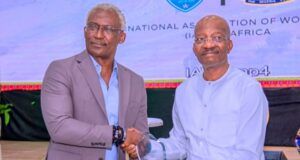 News Central TV Receives Award At The International Association Of Women Police Conference In Abuja L-R: Managing Director/Editor-in-Chief of News Central TV, Kayode Akintemi, left, being presented with an award as Pillar of Support for women for the television station by the Inspector General of Police, Kayode Egbetokun during the closing ceremony of the International Association of Women Police in Abuja...