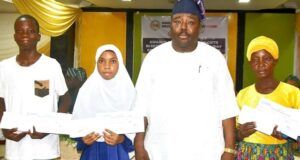 Senator Alli’s Holiday Coaching Program Yields Success As Beneficiaries Celebrate Outstanding Results Senator Sharafadeen Alli and some of the students...
