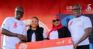 Excitement As UBA Rewards 110 Loyal Customers In Ongoing Legacy Promo L-R: Group Head, Retail and Digital Banking, United Bank for Africa, Shamsideen Fashola; One of the winners, in the ongoing UBA@75 Legacy Promo; Regional Head, Lagos, UBA, (Plc) Aminat Tunji Akinwande and Head, Retail Products and Sales, UBA, Prince Ayewoh during the promo raffle draw, dedicated to reward customers in commemoration of the banks 75th anniversary, held in Lagos on Saturday, October 26, at Ikeja City Mall, Lagos…