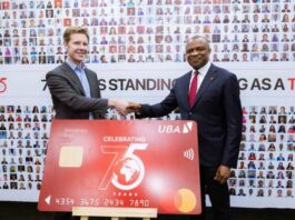 UBA's Oliver Alawuba, right, with Mastercard's topshot...at the event...