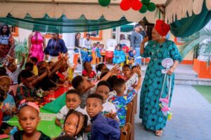 Hadjia Bolatito Adebisi left with her children