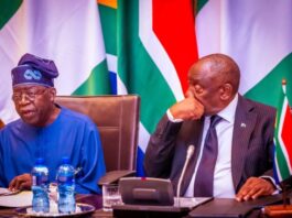 President Cyril Ramaphosa of South Africa, left, with Nigeria's President Bola Tinubu...