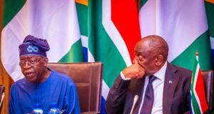 South Africa Relaxes Visa Rules For Nigerian Tourists, Bizmen President Cyril Ramaphosa of South Africa, left, with Nigeria's President Bola Tinubu...