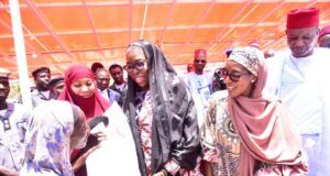 Dangote Foundation Flags Off ₦16B 2025 National Food Intervention Programme L-R: One of the beneficiaries receiving a10kg bag of Rice from, Dr. Khadija Sulaiman, Deputy Commandant Hisbah Women; Managing Director/ CEO, Aliko Dangote Foundation, Zouera Youssoufou; Executive Director Operations, Dangote Sugar Plc, Mariya Aliko Dangote, representing the Chairman/Founder, Aliko Dangote Foundation and Kano state Deputy Governor, Comrade. Aminu Abdulssalam Gwarzso,at the Aliko Dangote Foundation (ADF) Flag - Off ceremony of the 2025 National Food Intervention Programme & Distribution of Rice to 120,000 Beneficiaries in Kano state on Thursday 13 March 2025...