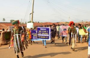 High Electricity Bills: Masquerades Lead Protest Against IBEDC IBEDC