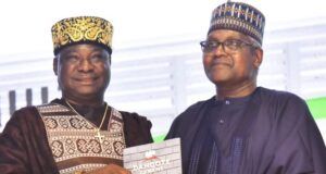 Excitement As Dangote Splashes ₦11bn In Gifts, Cash On Cement Distributors, Customers At Awards Nite …CEO, Nwa Ado Multi Biz Limited, Chief Akukalia Ikwueme, left, receiving the 1st runner-up award of Top National Distributor from Chairman, Dangote Cement Plc, Aliko Dangote, at Dangote Cement Plc Customer Awards and Gala Nite, in Lagos on Tuesday, May 27, 2025…
