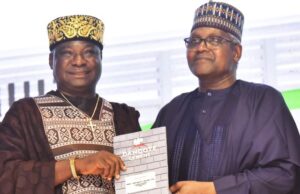 Excitement As Dangote Splashes ₦11bn In Gifts, Cash On Cement Distributors, Customers At Awards Nite …CEO, Nwa Ado Multi Biz Limited, Chief Akukalia Ikwueme, left, receiving the 1st runner-up award of Top National Distributor from Chairman, Dangote Cement Plc, Aliko Dangote, at Dangote Cement Plc Customer Awards and Gala Nite, in Lagos on Tuesday, May 27, 2025…