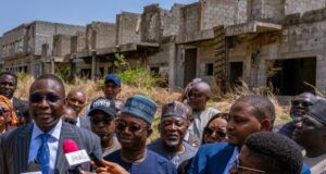 Asset Recovery & Handover: EFCC Hailed By Housing Minister EFCC's Mr. Ola Olukoyede, left, and others within the property...