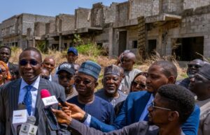 Asset Recovery & Handover: EFCC Hailed By Housing Minister EFCC's Mr. Ola Olukoyede, left, and others within the property...