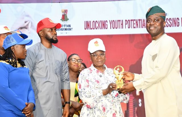 Seyi Makinde and others Governor Seyi Makinde receiving the Lifetime Achievement Award from Dr (Mrs) Victoria Samson, Managing Director of Bovas Oil and Gas, at the Oyo State Youth Summit, recently. With them are Ms Wasilat Adegoke, Commissioner for Youths and Sports, and Prince Deji Adeyemo, Secretary, Oyo Youth Summit Planning Committee...