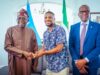 L-R: President Bola Tinubu, Bob Chikwem Amadi, a Nigerian medical student at the American International University in Saint Lucia and Prime Minister Philip J. Pierre...