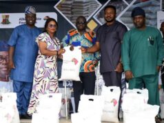 From left, Oyo State Commissioner for Budget and Economic Planning, Prof Musibau Babatunde; Senior Special Assistant to Oyo State Governor on Broadcast, Mrs Bosede Sodiq; One the beneficiaries, Head of Operations, Dangote Foundation, Mr Edero Victor Ejiro and Executive Assistant on Disabilities, to Oyo State Governor, Hon. Femi Timothy, during the flag-off of the distribution of food relief items under the Sustainable Action for Economic Recovery (SAfER), donated by Dangote Foundation, held at the Local Government House, Secretariat, Ibadan…