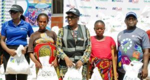 Prayers As Fidelity Bank Delivers Hope To Internally Displaced Persons In Benue Team Lead, CSR, Fidelity Bank Plc, Victoria Abuka (left); CEO, The Abbasid Charity Foundation, Hauwa Abbas (Centre); and Branch Leader, Fidelity Bank Plc, Makurdi, Terwase (Right), representing the Regional Bank Head, North Central, Sadi Zawiya, with some beneficiaries during the Fidelity Food Bank distribution event in Makurdi, Benue State recently...