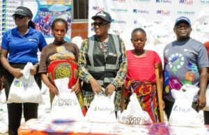Prayers As Fidelity Bank Delivers Hope To Internally Displaced Persons In Benue Team Lead, CSR, Fidelity Bank Plc, Victoria Abuka (left); CEO, The Abbasid Charity Foundation, Hauwa Abbas (Centre); and Branch Leader, Fidelity Bank Plc, Makurdi, Terwase (Right), representing the Regional Bank Head, North Central, Sadi Zawiya, with some beneficiaries during the Fidelity Food Bank distribution event in Makurdi, Benue State recently...