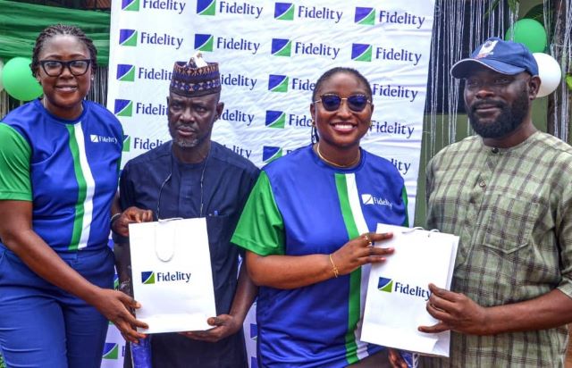 Fidelity Image 2 L-R: The Team Lead, CSR, Fidelity Bank Plc, Victoria Abuka; Vice Principal, Government Secondary School, Aso Pada, Maraba, Mr. Abdullahi Idris; Project Co-ordinator, Elite Bankers 2025 Inductee Class, Fidelity Bank Plc, Onyinyechi Ihesiaba; Vice Principal -Academics, Government Secondary School, Aso Pada, Maraba, Mr. Ela Isa; during the commissioning of a renovated block of classrooms and the distribution of Back-to-School Materials at Government Secondary School Aso Pada, Maraba, Nassarawa State recently…