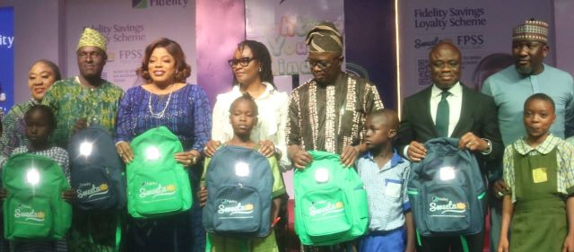 Fidelity Image L-R: Special Adviser, Ministry of Women Affairs, Ogun State Hon Ayotunde Lawal,; Director of Cooperative Services, Ogun State, Mr. Mustapha Samuel; Managing Director/Chief Executive Officer, Fidelity Bank Plc, Dr Nneka Onyeali-Ikpe; First Lady of Ogun State, Her Excellency Mrs. Bamidele Abiodun; Commissioner for Education, Ogun State, Professor Abayomi Arigbabu; Executive Director -Lagos & South West, Dr. Ken Opara; and Executive Director -North, Mr. Sufiyanu Garba (both of Fidelity Bank Plc); at the launch of the Fidelity Solar Powered Bags in Abeokuta, Ogun State recently…