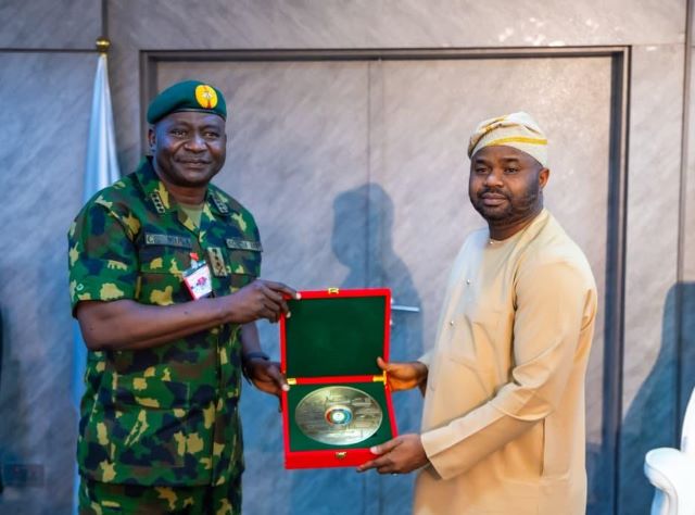 FIRS image …Chief of Defence Staff, General Christopher Musa presenting a plaque to the chairman, Federal Inland Revenue Service (FIRS), Dr Zacch Adedeji, during a visit to the Revenue House in Abuja, on Wednesday… Photo credit: Victor Onarinde