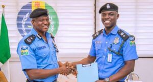 New Force PRO, Benjamin Hundeyin Assumes Office In Abuja Olumuyiwa Adejobi, left, with Benjamin Hundeyin...in Abuja on Thursday...