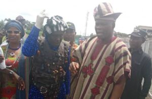 WhatsApp Image 20250923 at 22158 PM | PM Parrot Dr Wasiu Olatubosun Oyo State's Commissioner for Tourism and Culture, right, with one of the masqueraders...