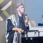 Alhaji Lai Mohammeddelivering his address
