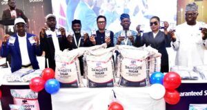 Dangote Unveils New Sugar Pack Sizes At Lagos Trade Fair, Recommits To Nigeria’s Full Industrialization L-R: Customer Relationship Manager, Group Commercial Operations, Dangote Industries Limited, Garba El-Suleiman; Head, Sales & Marketing, Dangote Sugar Refinery Plc, Bello Saddiq; LCCI Vice President/Chairman, Promotion Board, Prince Abimbola Olasore; Group Managing Director/CEO, Dangote Sugar Refinery Plc, Ravindra Singhvi; President, Lagos Chamber of Commerce and Industry (LCCI), Gabriel Idahosa; Group Sales and Marketing Director, Dangote Cement Plc, Funmi Sanni, (Rep. of GED Commercial Operations, Dangote Industries Limited) and Deputy President, Lagos Chamber of Commerce and Industry (LCCI), Engr. Leye Kupoluyi at Dangote Special Day during which Dangote Sugar unveiled its 25kg and 10g retail pack at the 2025 Lagos International Trade Fair, in Lagos on Wednesday, November 12, 2025…