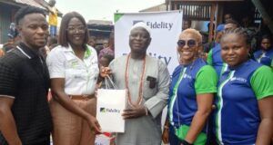 CSR: Fidelity Bank Extends Lifeline To Makoko Community In Lagos L-R: Proprietor, Part of Solution School, Makoko, Prince Shemede Taiwo; Team Lead, CSR, Fidelity Bank Plc, Victoria Abuka; Traditional Leader of Makoko Community, Shemede Emmanuel Ajaka; Head, HR Business Partnerships & Communication, Fidelity Bank Plc, Nwamaka Kalu; and Class Governor, Achievers’ Inductees Class, Fidelity Bank Plc, Oluwabusayo Obagunwa, during the Fidelity Helping Hands Program (FHHP) outreach and donation of food items and other relief materials to residents of Makoko, Lagos…