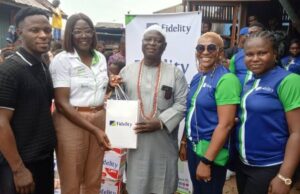 CSR: Fidelity Bank Extends Lifeline To Makoko Community In Lagos L-R: Proprietor, Part of Solution School, Makoko, Prince Shemede Taiwo; Team Lead, CSR, Fidelity Bank Plc, Victoria Abuka; Traditional Leader of Makoko Community, Shemede Emmanuel Ajaka; Head, HR Business Partnerships & Communication, Fidelity Bank Plc, Nwamaka Kalu; and Class Governor, Achievers’ Inductees Class, Fidelity Bank Plc, Oluwabusayo Obagunwa, during the Fidelity Helping Hands Program (FHHP) outreach and donation of food items and other relief materials to residents of Makoko, Lagos…