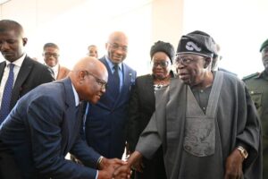 President Bola Tinubu right with Nyesom Wike at the event