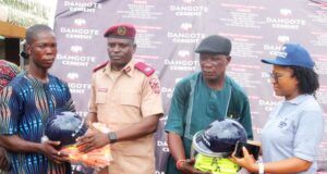 Dangote Cement Empowers Drivers, Riders, Leads Ember Month Awareness …Federal Road Safety Unit Commander Ilaro, Sulaiman Oluwadunmiye (Second left) presenting Safety kits to a beneficiary and Dangote Cement Plc, Group Head Transport /HSE, Ebere Okonkwo (right) also presents safety kits to the Chairman of the Ilaro Okada Riders Association, Comrade Adekunjo Dauda; During the Dangote Cement Plc, Ibese Plant 2025 Edition of Ember Months Road Safety Campaign in Ilaro, Ogun state…