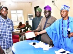 Students In Ijebu Igbo Benefit From Dangote Granite Mines’ Bursary Awards L-R: Shoneye Damilola, a student beneficiary from Beje High school, receiving the bursary Cheque; General Manager, Community Relations, Dangote Granite Mines Ltd, Pastor Joseph Alabi; Dangote Granite Mines Ltd, General Manager, Projects Control, Samuel K. Fagbile and High Chief Ademola Ogunyale, a representatives of His Royal Highness…
