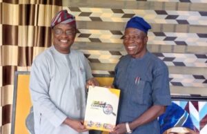 The Polytechnic Ibadan’s Ag Rector, Dr Taiwo Lasisi Receives Copy Of ParrotXtra’s 20th Anniversary Compendium Ambassador Olayinka Agboola, left, with Dr Taiwo Lasisi...