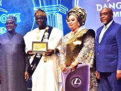 Dangote Cement Hosts Awards Nite, Splashes ₦15bn In Gifts, Cash To Appreciate Distributors L-R: President/CE, Dangote Industries Limited, Aliko Dangote; Overall Winner, Otunba Kazeem Olayemi Odeyeyiwa, MD/CEO Kazab Heritage Limited and his wife, Chief Mrs Adesola Odeyeyiwa; Chairman, Dangote Cement Plc, Emmanuel Ikazoboh at the Dangote Cement Plc 2025 Customer Award Night and Celebration, in Lagos on Wednesday, 14 January, 2026…
