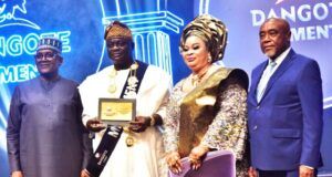 Dangote Cement Hosts Awards Nite, Splashes ₦15bn In Gifts, Cash To Appreciate Distributors L-R: President/CE, Dangote Industries Limited, Aliko Dangote; Overall Winner, Otunba Kazeem Olayemi Odeyeyiwa, MD/CEO Kazab Heritage Limited and his wife, Chief Mrs Adesola Odeyeyiwa; Chairman, Dangote Cement Plc, Emmanuel Ikazoboh at the Dangote Cement Plc 2025 Customer Award Night and Celebration, in Lagos on Wednesday, 14 January, 2026…