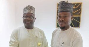 Centre For Positive Value Reorientation & Advocacy Honours NOA Mallam Lanre Issa Onilu, left, receives NOA's award...