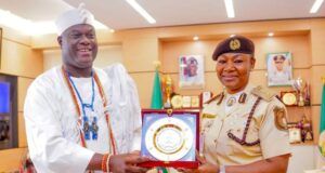 Ooni Salutes Tinubu’s Immigration Reforms As He Renews Diplomatic Passport ...the Comptroller-General of the Nigeria Immigration Service, Kemi Nandap, right, with the Ooni of Ife, Oba Adeyeye Ogunwusi...