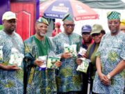 Abiodun Commends Dangote For Boosting Ogun’s Industrial Competitiveness OGUNCCIMA President, Lion Niyi Oshiyemi; Representative of Ogun State governor and Commissioner for Industry, Trade and Investment, Mr. Emmanuel Adebola Sofela; Commissioner for Education, Prof. Abayomi Arigbabu and the Permanent Secretary, Ogun State Ministry of Industry, Trade and Investment, Engr. Kehinde Akintomide holding packs of Dangote Sugar, Rice and Salt when they visited the Dangote Group stand at the ongoing Trade Fair in Abeokuta…