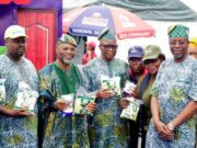 Dangote Charts Bold Course for Agricultural & Industrial Exports At Gateway Trade Fair L-R: OGUNCCIMA President, Lion Niyi Oshiyemi; Representative of Ogun State governor and Commissioner for Industry, Trade and Investment, Mr. Emmanuel Adebola Sofela; Commisioner for Education, Prof. Abayomi Arigbabu and the Permanent Secretary, Ogun State Ministry of Industry, Trade and Investment, Engr. Kehinde Akintomide holding packs of Dangote Sugar, Rice and Salt when they visited the Dangote Group stand during the Dangote Day at the ongoing Trade Fair in Abeokuta…