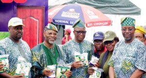 Dangote Charts Bold Course for Agricultural & Industrial Exports At Gateway Trade Fair L-R: OGUNCCIMA President, Lion Niyi Oshiyemi; Representative of Ogun State governor and Commissioner for Industry, Trade and Investment, Mr. Emmanuel Adebola Sofela; Commisioner for Education, Prof. Abayomi Arigbabu and the Permanent Secretary, Ogun State Ministry of Industry, Trade and Investment, Engr. Kehinde Akintomide holding packs of Dangote Sugar, Rice and Salt when they visited the Dangote Group stand during the Dangote Day at the ongoing Trade Fair in Abeokuta…