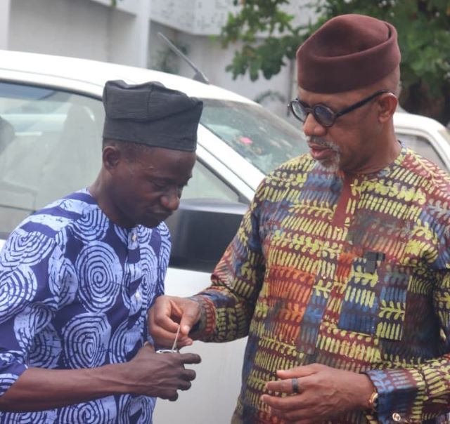 Gov Abiodun presenting car gift to Solanke Taiwo