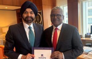 Photo: World Bank President Plays Host To Aliko Dangote In Washington DC …the President/Chief Executive of Dangote Industries Limited, Aliko Dangote (right) presenting a souvenir to the President of World Bank Group, Mr. Ajay Banga…